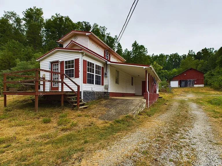 Charming Farmhouse on 71+ Acres with Barn, Pond & Income Potential | $199,000