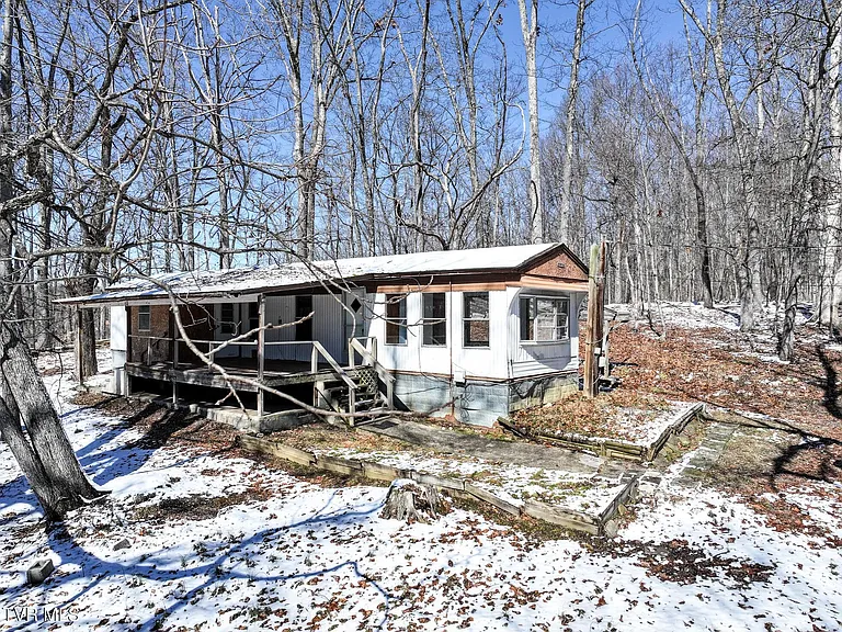 Secluded 5.65-Acre Property with Mountain Views & Detached Garage | $125,000