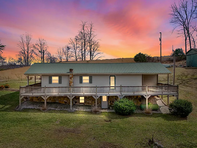 Tennessee Farmhouse on 10.5 Acres – Barn, Pond & Breathtaking Mountain Views! | $275,000