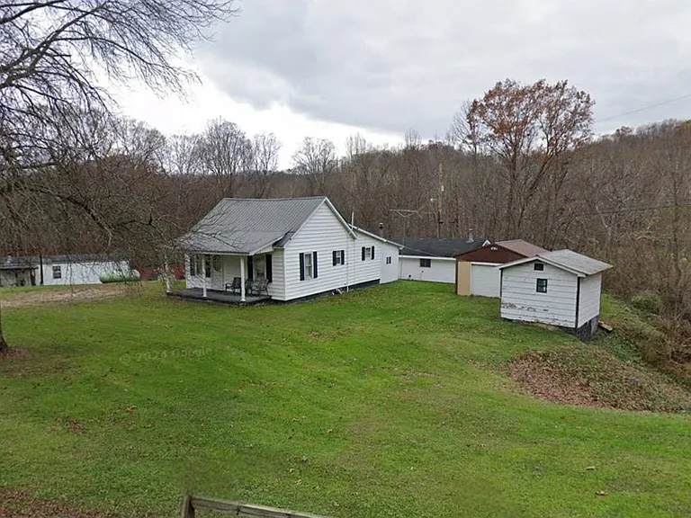 First-Time Listing! Cozy Farmhouse with Detached Apartment on 2 Acres | $138,000