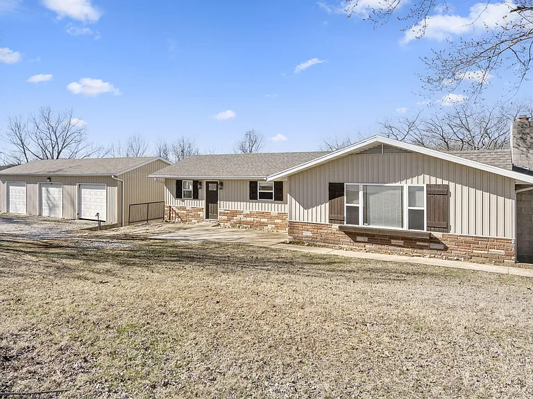 Peaceful 2.5-Acre Retreat with Oversized 3-Car Shop – Prime Branson Location! | $210,000