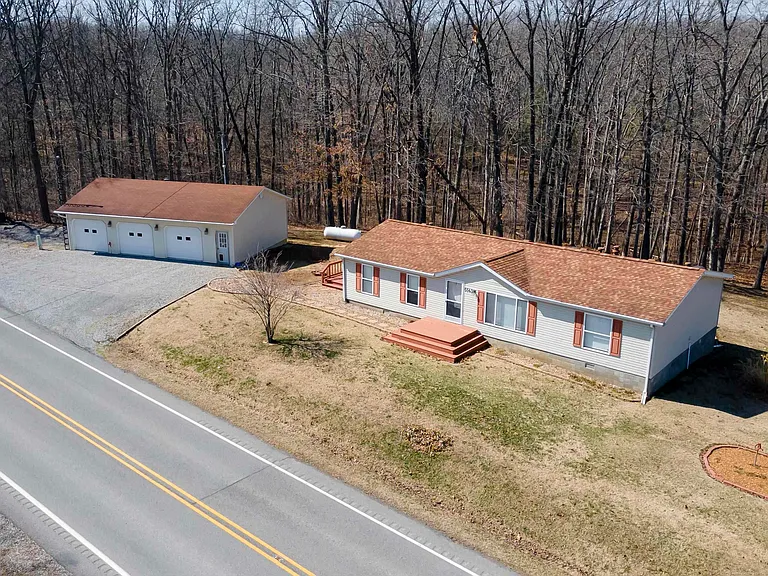 Charming 3-Bedroom Home on 1.5 Acres with Detached Garage & Pole Barn! | $149,900