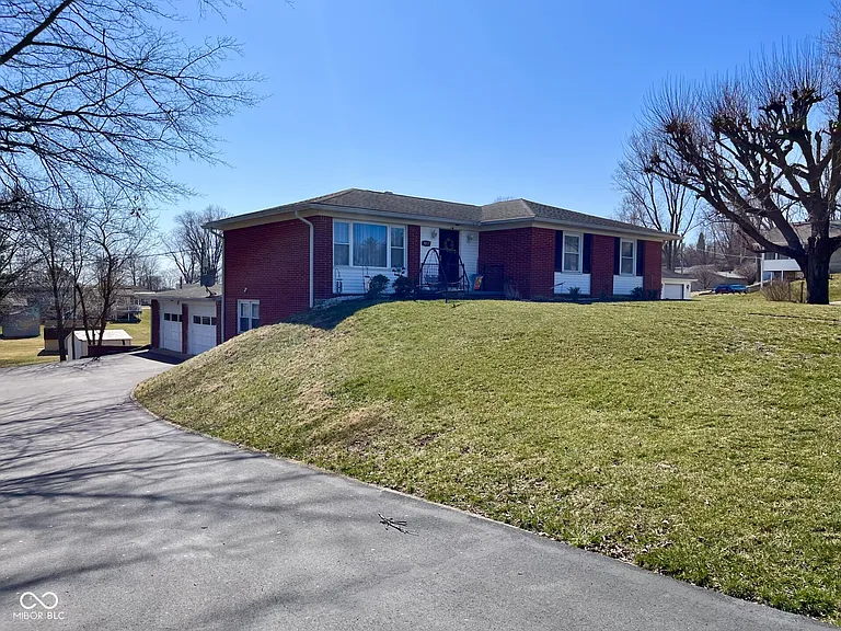 Spacious 4-Bedroom Brick Home with Walk-Out Basement & Guest Suite! | $225,000