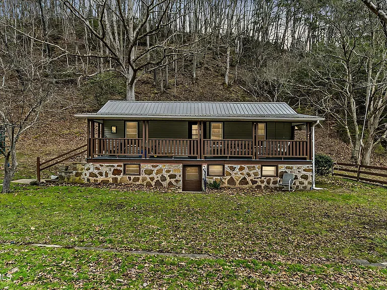 64.75-Acre Fenced Farm with Cabin, Creek & Outbuildings – Ideal for Ranching & Recreation! | $299,985