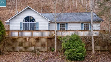 Photo of Creekfront Home with Workshop on 14± Private Acres in Roan Mountain, Tennessee