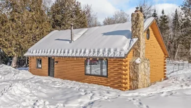 Photo of 40-Acre Log Home Retreat Along the Sturgeon River in Foster City, Michigan