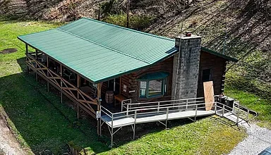 Photo of 10 Acres of Rustic Mountain Charm in Scott Depot, WV – Custom Log Cabin Retreat